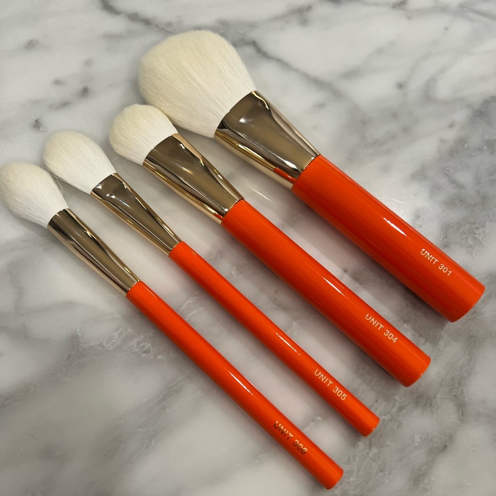 Brand NEW Units orange series face brushes - set of 4
